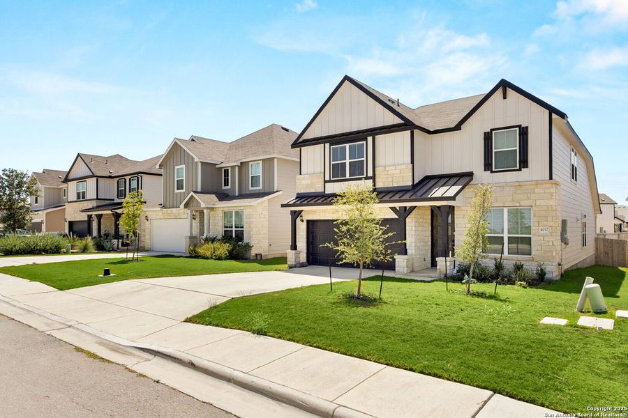 Front exterior of a new home in Lily Springs, Seguin, TX, highlighting curb appeal (Image 19).