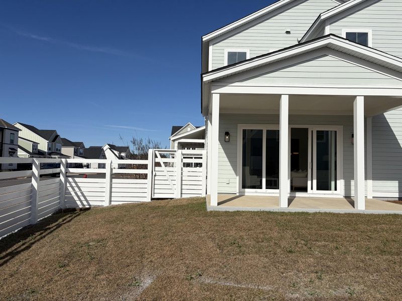 Exterior details and patio area of a home in Nexton - Midtown, Summerville (Image 25).