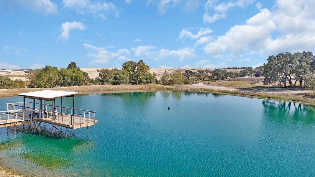 Dock with a water view and boat lift