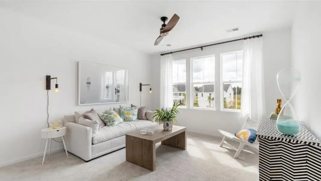 Furnished interior view inside a new home in Heron's Walk at Summers Corner: Row Collection, Summerville (Image 4).