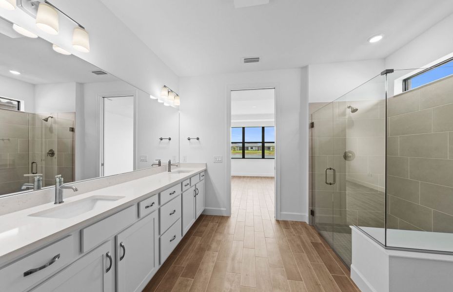 Furnished interior view inside a new home in Del Webb Naples, Ave Maria (Image 6).