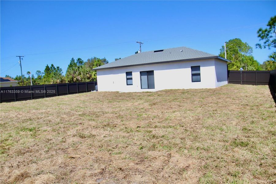 Exterior details and patio area of a home in , Lehigh Acres (Image 3).