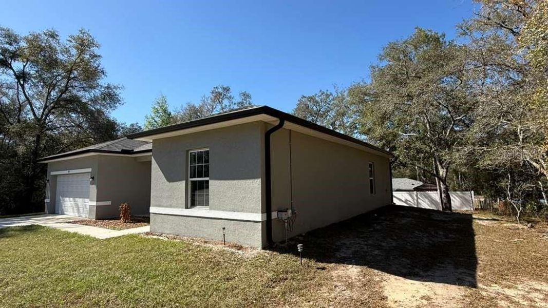 Exterior details and patio area of a home in , Citrus Springs (Image 3). Exterior details and patio area of a home in , Citrus Springs (Image 3).