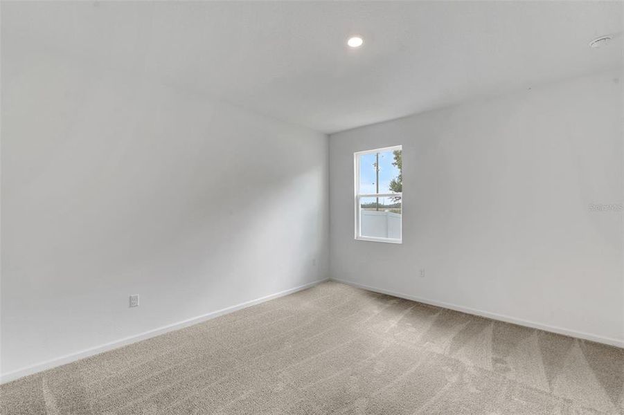 Spacious, unfurnished interior of a new home in Annabelle Estates, Winter Haven (Image 28).