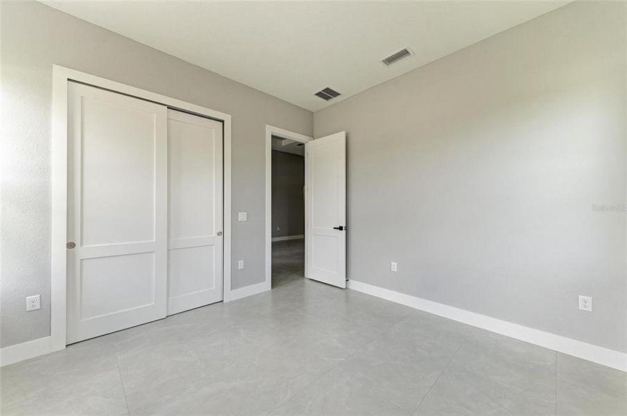 Spacious, unfurnished interior of a new home in , Port Charlotte (Image 39).