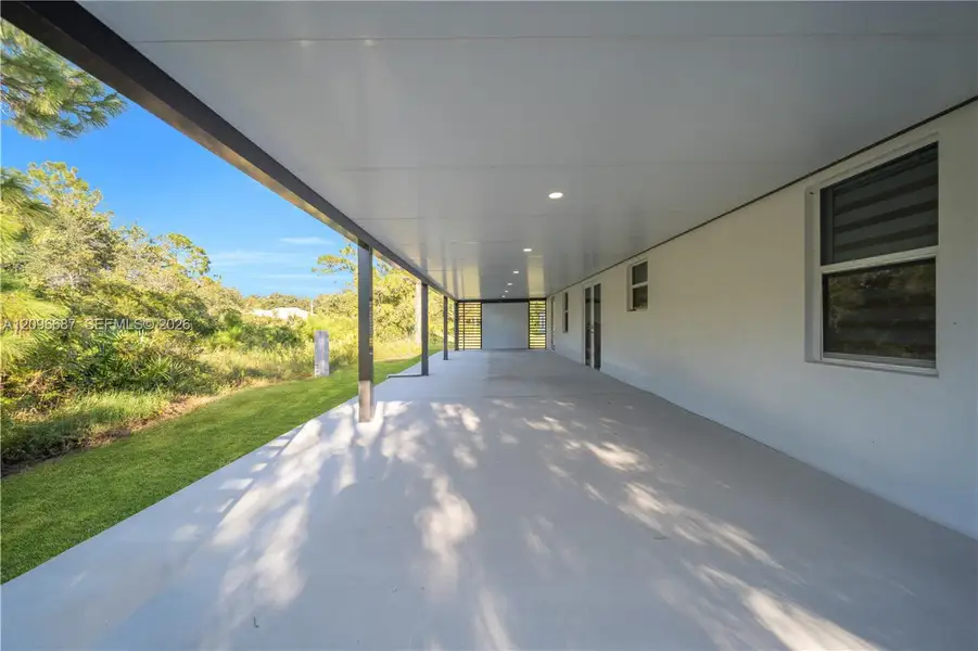 Exterior details and patio area of a home in , Lehigh Acres (Image 3).
