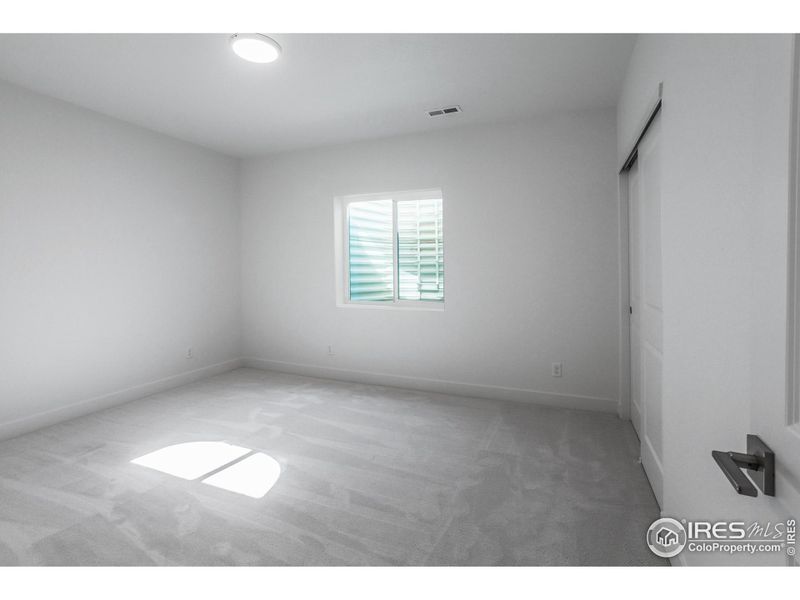 SECONDARY BEDROOM IN BASEMENT