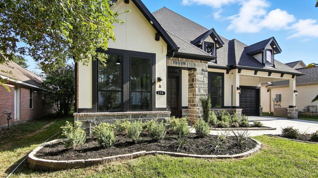 Front exterior of a new home in , Montgomery, TX, highlighting curb appeal (Image 20). Front exterior of a new home in , Montgomery, TX, highlighting curb appeal (Image 20).