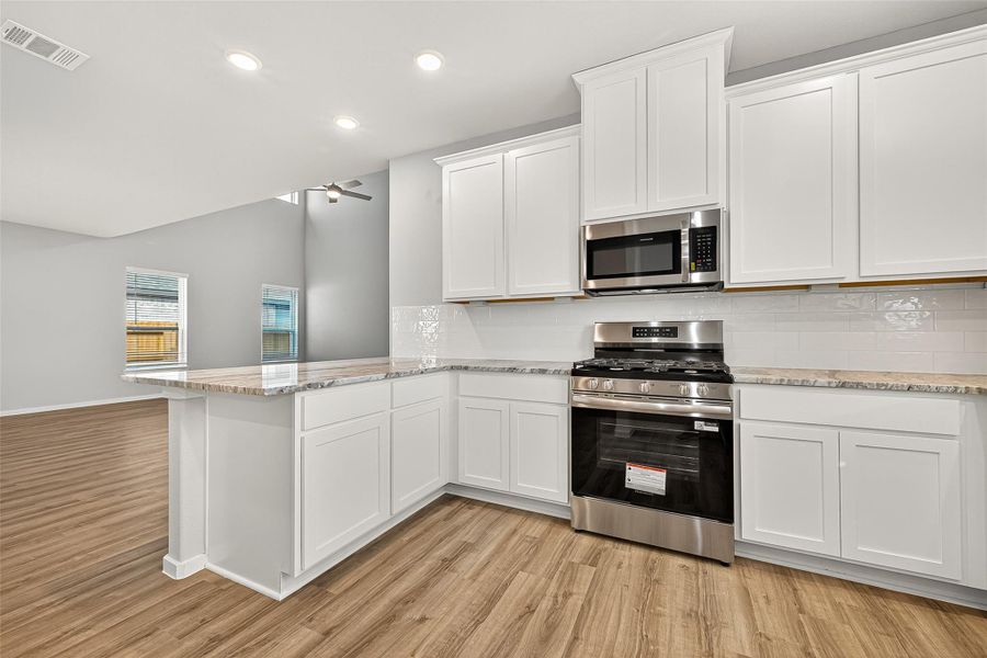 Furnished interior view inside a new home in Sunterra, Katy (Image 11). Furnished interior view inside a new home in Sunterra, Katy (Image 11).