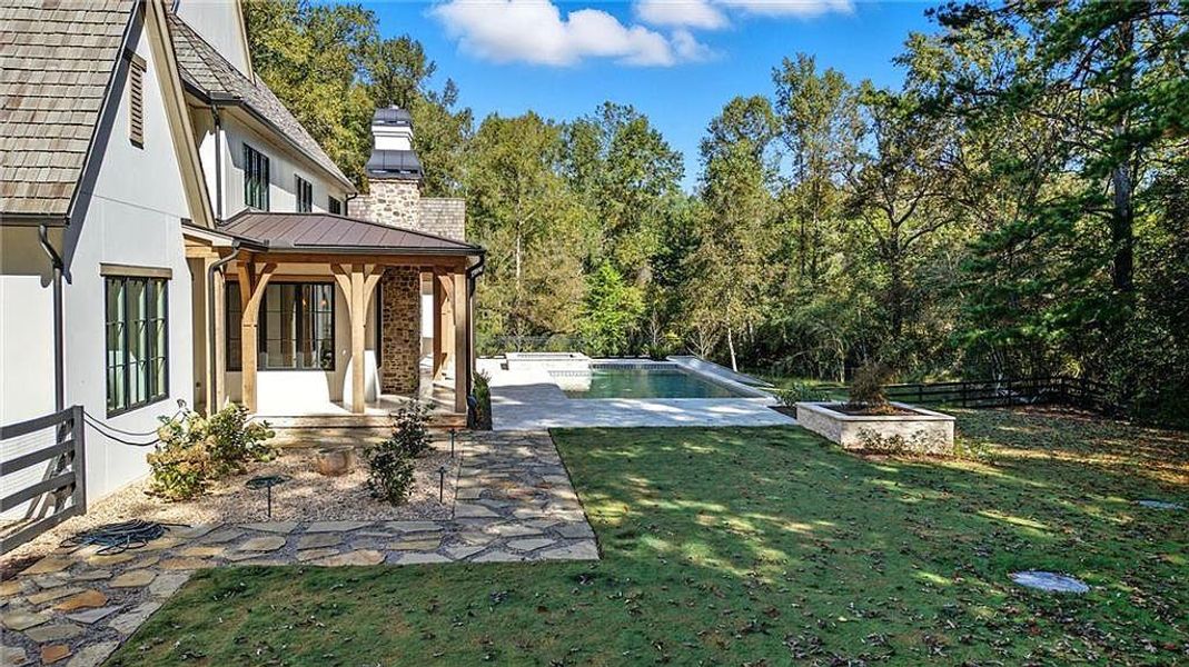 Exterior details and patio area of a home in Crossroads, Alpharetta (Image 3).