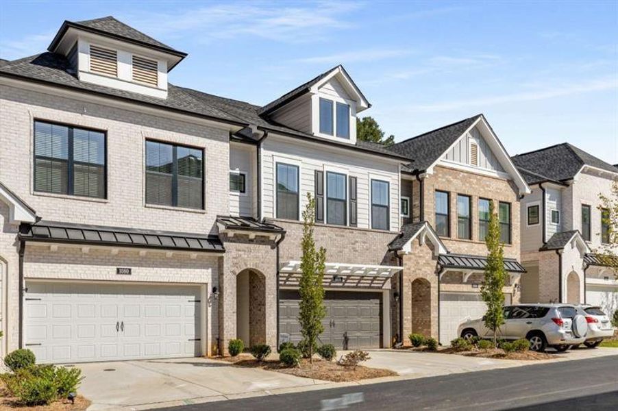 Front exterior of a new home in , Alpharetta, GA, highlighting curb appeal (Image 24).