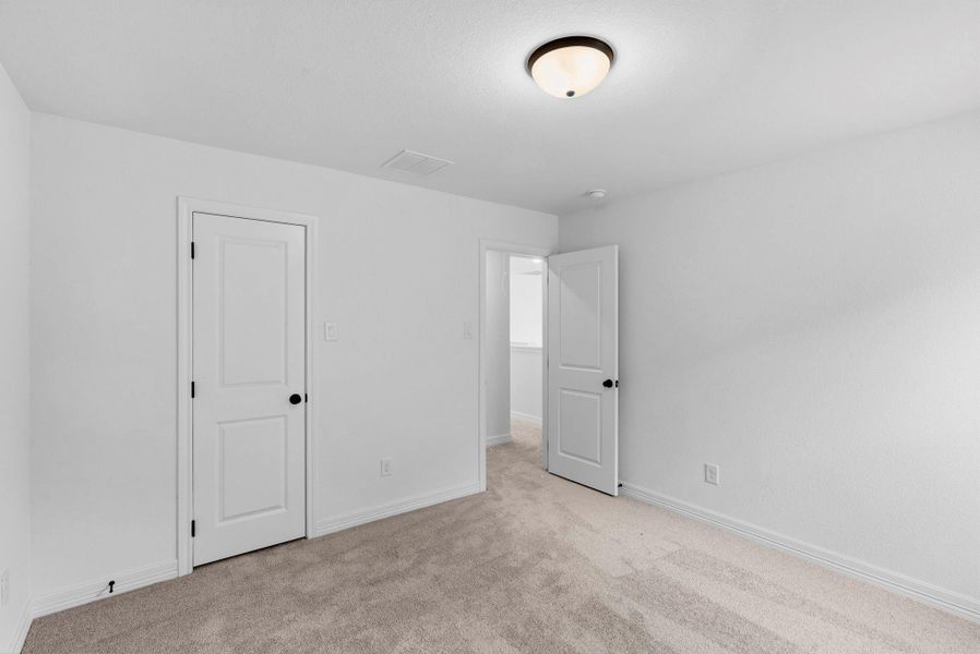 Spacious, unfurnished interior of a new home in Spring Creek Trails, Magnolia (Image 32).