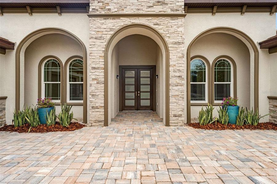 Exterior details and patio area of a home in , Trinity (Image 36).