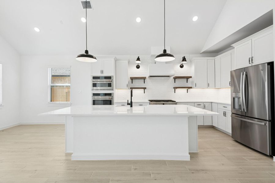 Gourmet island kitchen (*Photo not of actual home and used for illustration purposes only.) Gourmet island kitchen (*Photo not of actual home and used for illustration purposes only.)