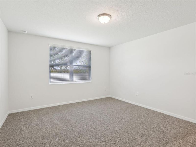 Spacious, unfurnished interior of a new home in The Reserve at Van Oaks, Auburndale (Image 21).