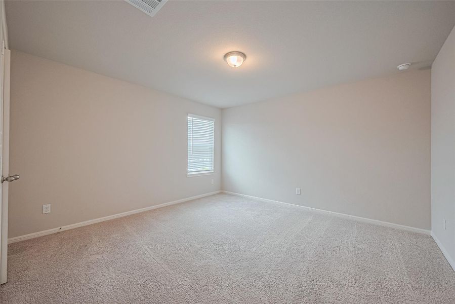 Spacious, unfurnished interior of a new home in Sunterra, Katy (Image 28).