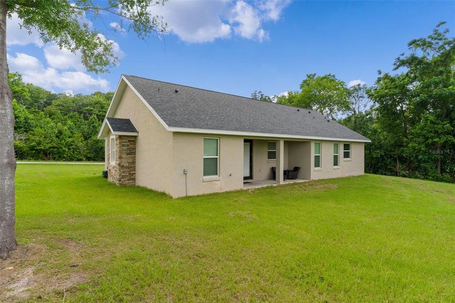 Exterior details and patio area of a home in , Ocala (Image 4).
