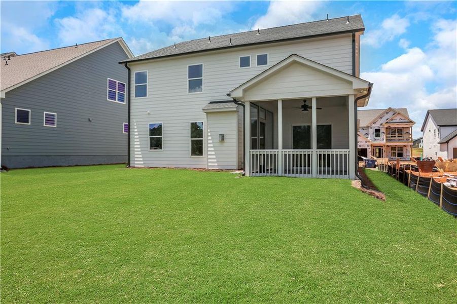 Front exterior of a new home in Twin Lakes, Hoschton, GA, highlighting curb appeal (Image 23). Front exterior of a new home in Twin Lakes, Hoschton, GA, highlighting curb appeal (Image 23).