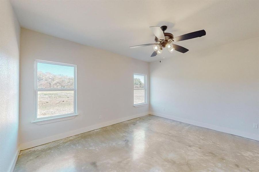 Spare room featuring ceiling fan