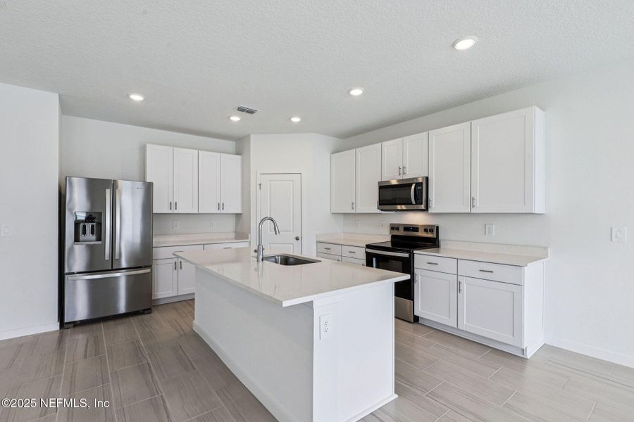 Furnished interior view inside a new home in Flagler Village - Signature Series, Palm Coast (Image 3).