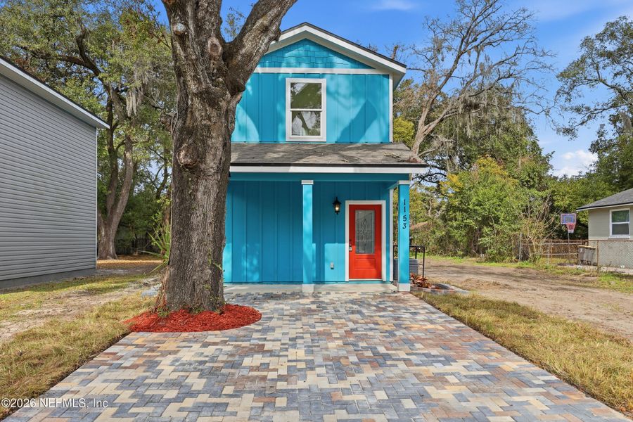 Front exterior of a new home in , Jacksonville, FL, highlighting curb appeal (Image 16).