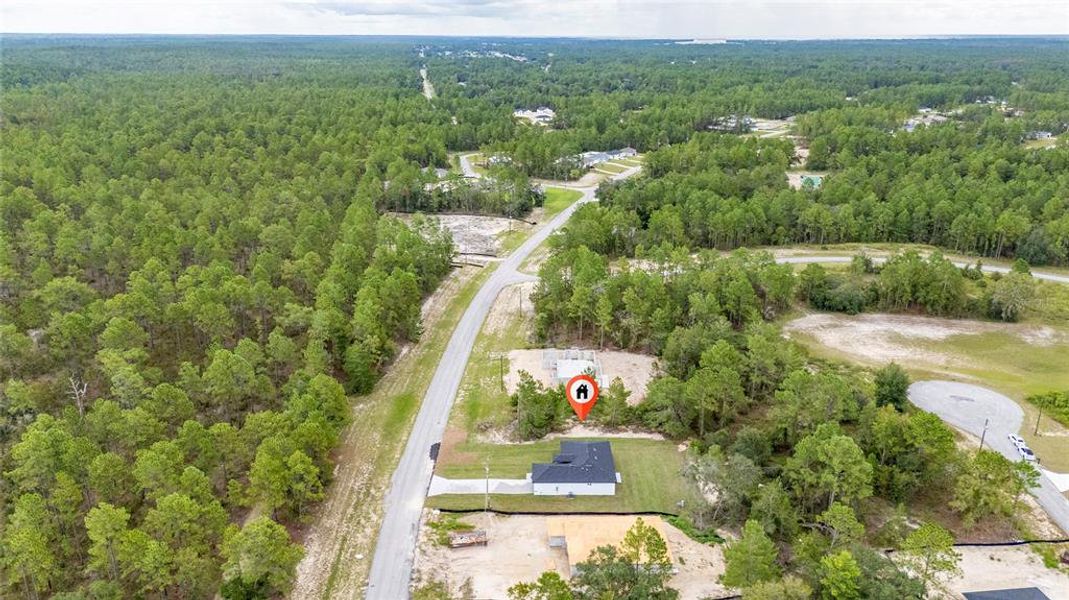Front exterior of a new home in , Ocala, FL, highlighting curb appeal (Image 23).