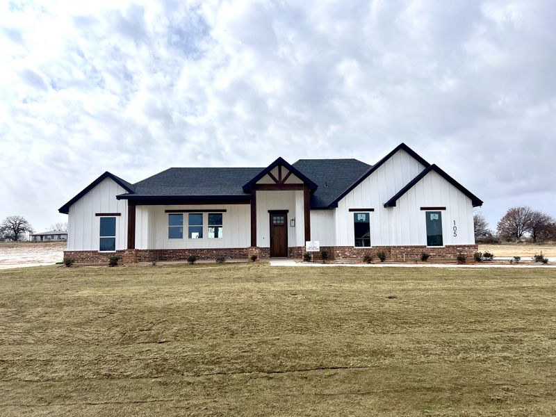 Front exterior of a new home in Zion Valley, Poolville, TX, highlighting curb appeal (Image 1). Front exterior of a new home in Zion Valley, Poolville, TX, highlighting curb appeal (Image 1).