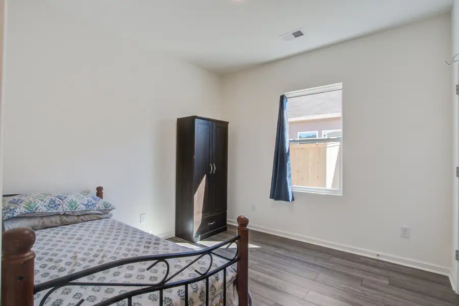 Furnished interior view inside a new home in Pender Woods at Cane Bay, Summerville (Image 3).