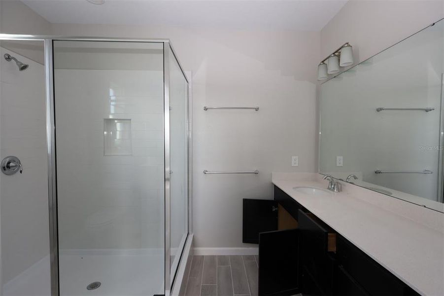 Furnished interior view inside a new home in Tribute at Ovation, Winter Garden (Image 9).