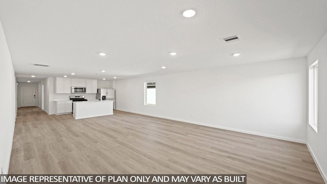 Unfurnished living room featuring light wood-style floors and recessed lighting