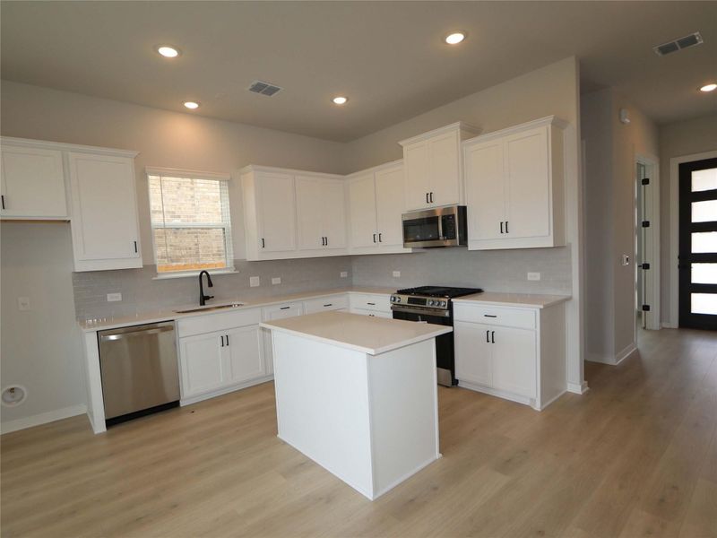 Furnished interior view inside a new home in Estancia West, Manchaca (Image 8).