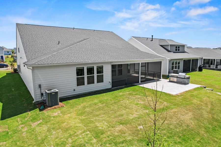 Exterior details and patio area of a home in Carolina Riverside, Belmont (Image 4).