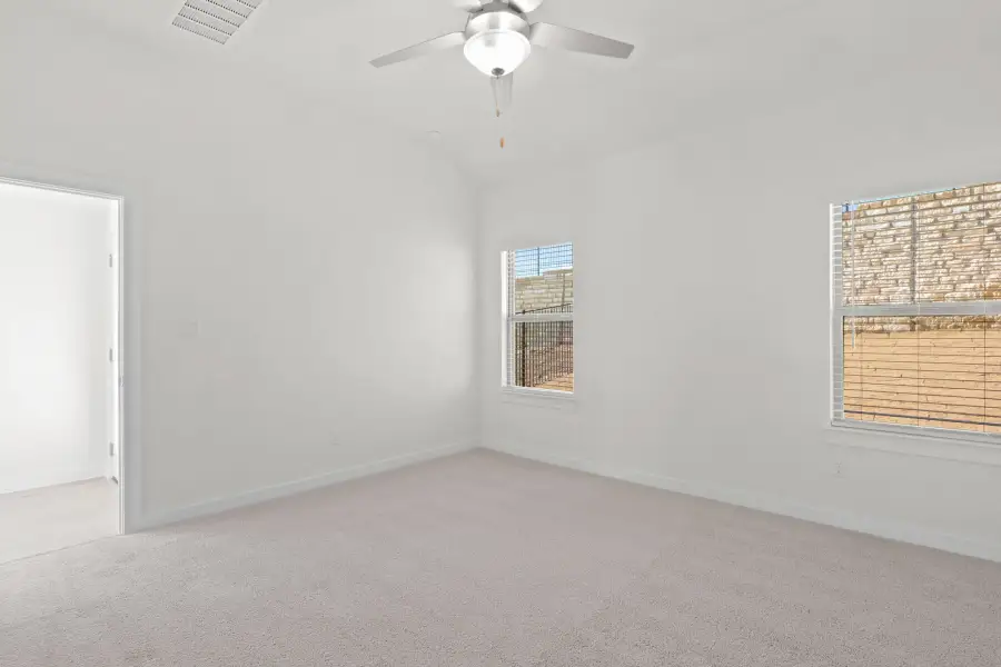 Primary Bedroom in the Pecan II home plan by Trophy Signature Homes – REPRESENTATIVE PHOTO Primary Bedroom in the Pecan II home plan by Trophy Signature Homes – REPRESENTATIVE PHOTO