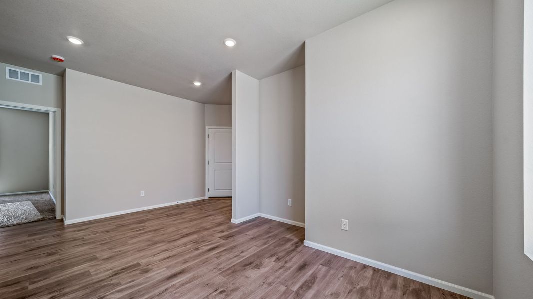 Spacious, unfurnished interior of a new home in The Reserve at Green Valley Ranch, Aurora (Image 29).