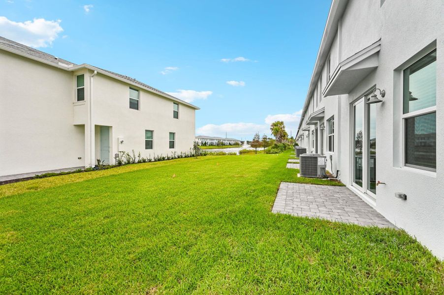Front exterior of a new home in Tidewater, Fort Pierce, FL, highlighting curb appeal (Image 22). Front exterior of a new home in Tidewater, Fort Pierce, FL, highlighting curb appeal (Image 22).