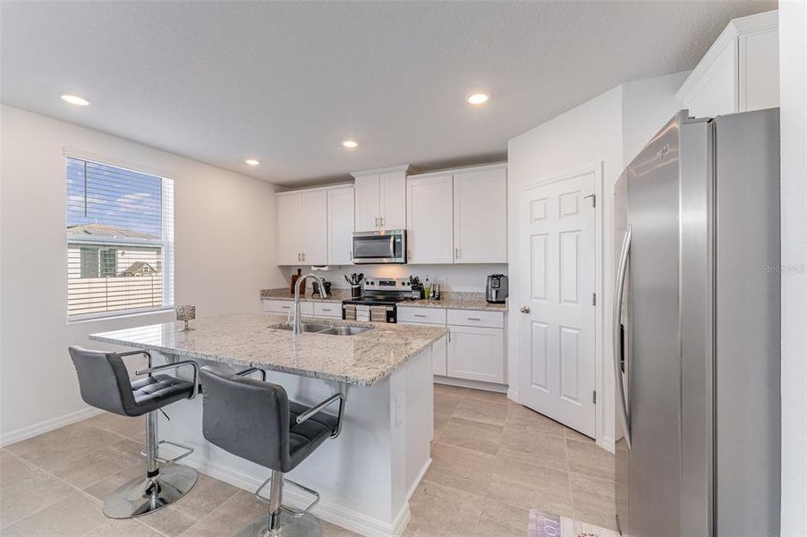 Furnished interior view inside a new home in Villamar - Signature Series, Winter Haven (Image 29).