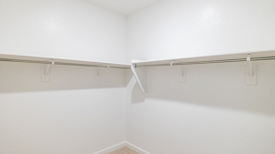 Spacious, unfurnished interior of a new home in Zanjero Pass, Waddell (Image 20).