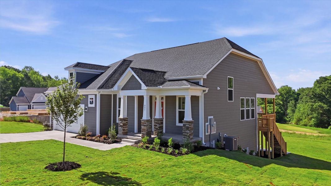 Front exterior of a new home in Pinebrook, Woodruff, SC, highlighting curb appeal (Image 20). Front exterior of a new home in Pinebrook, Woodruff, SC, highlighting curb appeal (Image 20).