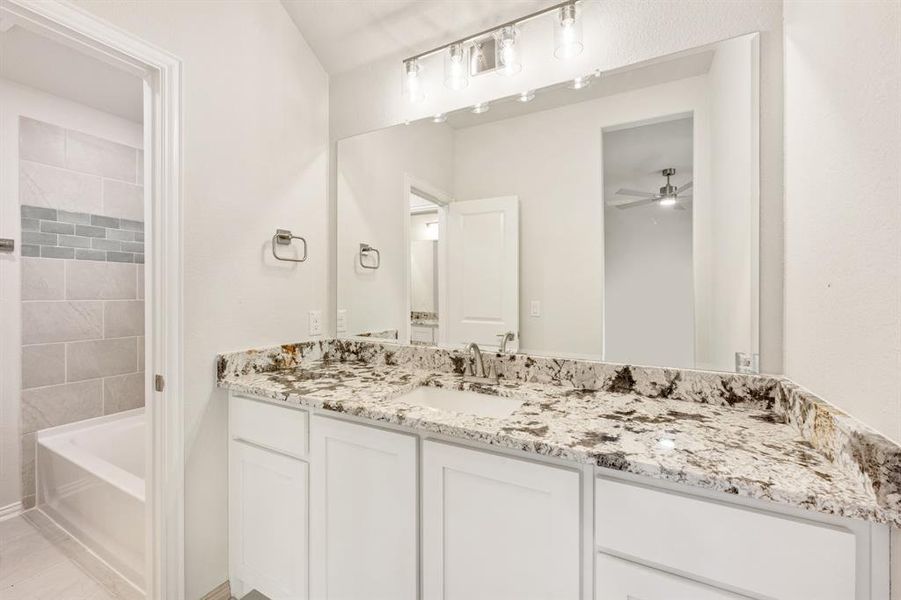 Furnished interior view inside a new home in Sunrise at Garden Valley, Waxahachie (Image 17).