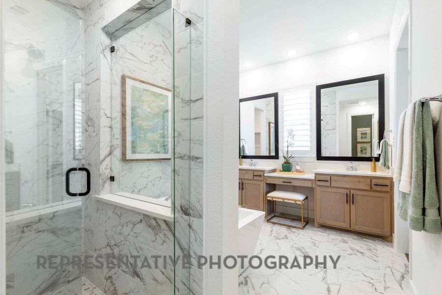 Full bathroom featuring marble finish floor, a marble finish shower, recessed lighting, and vanity Full bathroom featuring marble finish floor, a marble finish shower, recessed lighting, and vanity