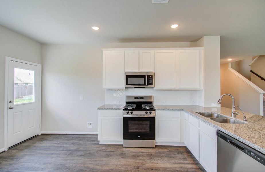 Furnished interior view inside a new home in Legends Bay, Baytown (Image 5).