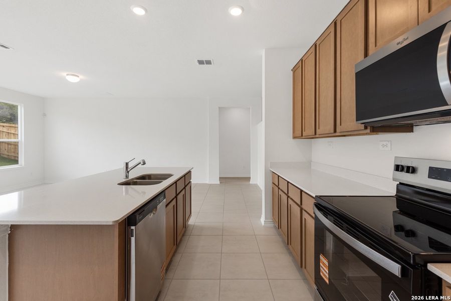 Furnished interior view inside a new home in Hidden Bluffs at TRP, San Antonio (Image 9).