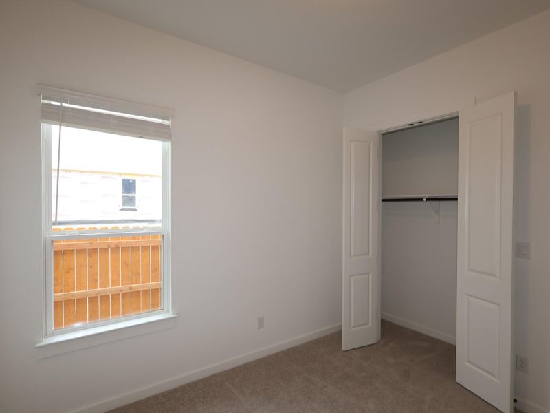 Spacious, unfurnished interior of a new home in Heritage, Dripping Springs (Image 8).