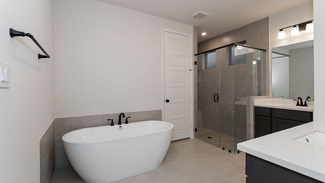 Furnished interior view inside a new home in Lakes of Cane Island, Katy (Image 5).