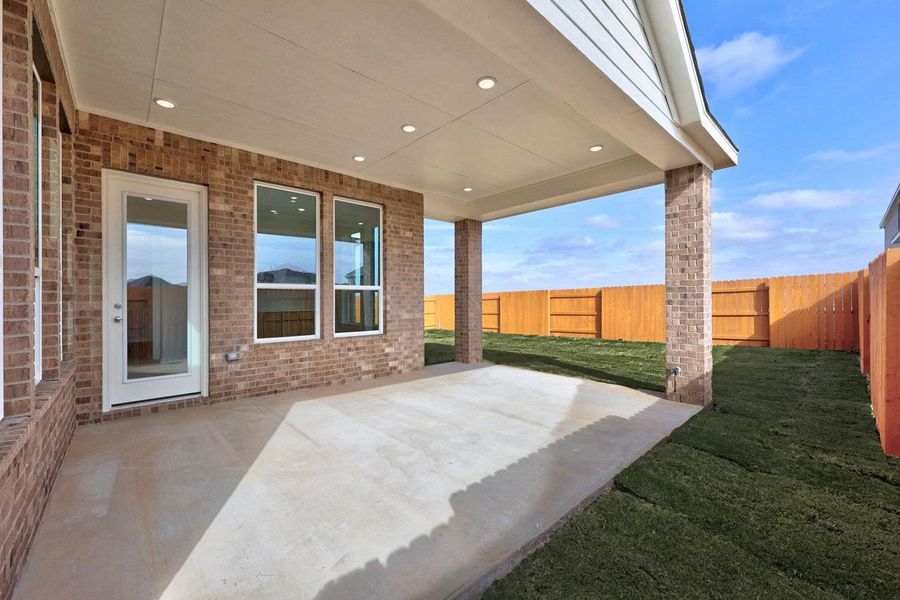 Exterior details and patio area of a home in Lariat, Liberty Hill (Image 2). Exterior details and patio area of a home in Lariat, Liberty Hill (Image 2).