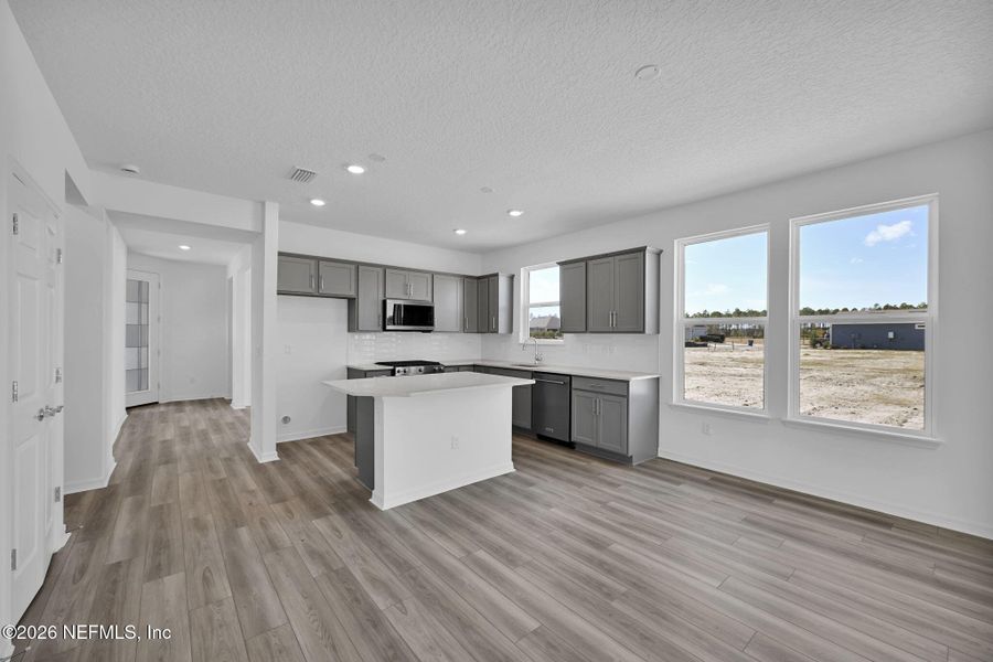 Furnished interior view inside a new home in Del Webb Wildlight, Yulee (Image 10).