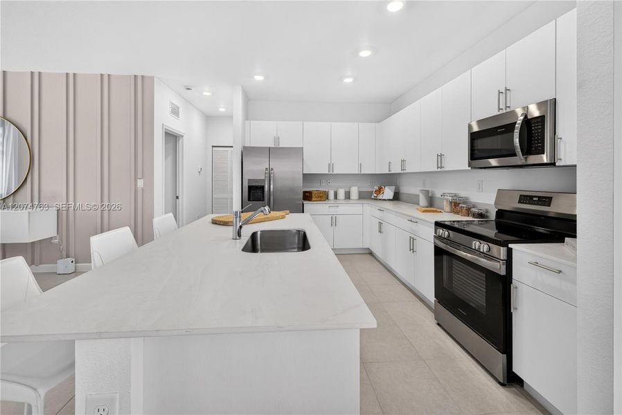 Furnished interior view inside a new home in Acacia Groves, Miami (Image 4).