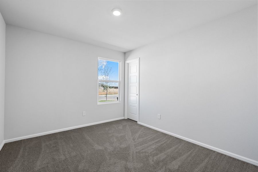 Representative unfurnished interior of a home built from the BELLVUE by D.R. Horton in Faculty Row, Abilene (Image 43).