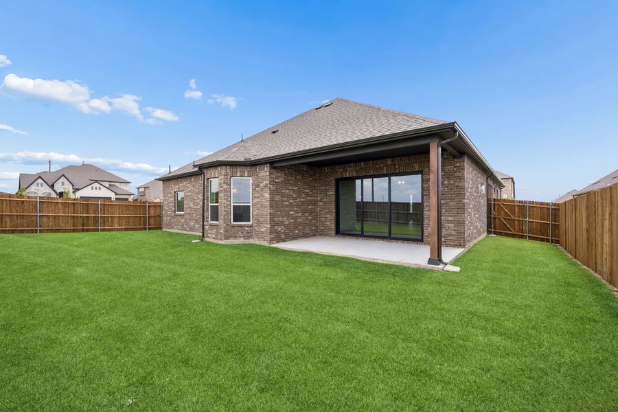 Exterior details and patio area of a home in Country Lakes, Denton (Image 3). Exterior details and patio area of a home in Country Lakes, Denton (Image 3).