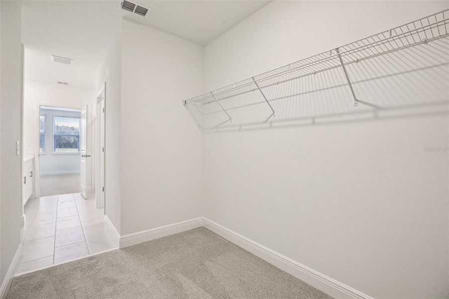 Spacious, unfurnished interior of a new home in The Reserve at Hammock Oaks - Classic Series, Lady Lake (Image 34).